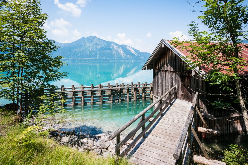 A sea hut with mountains behind