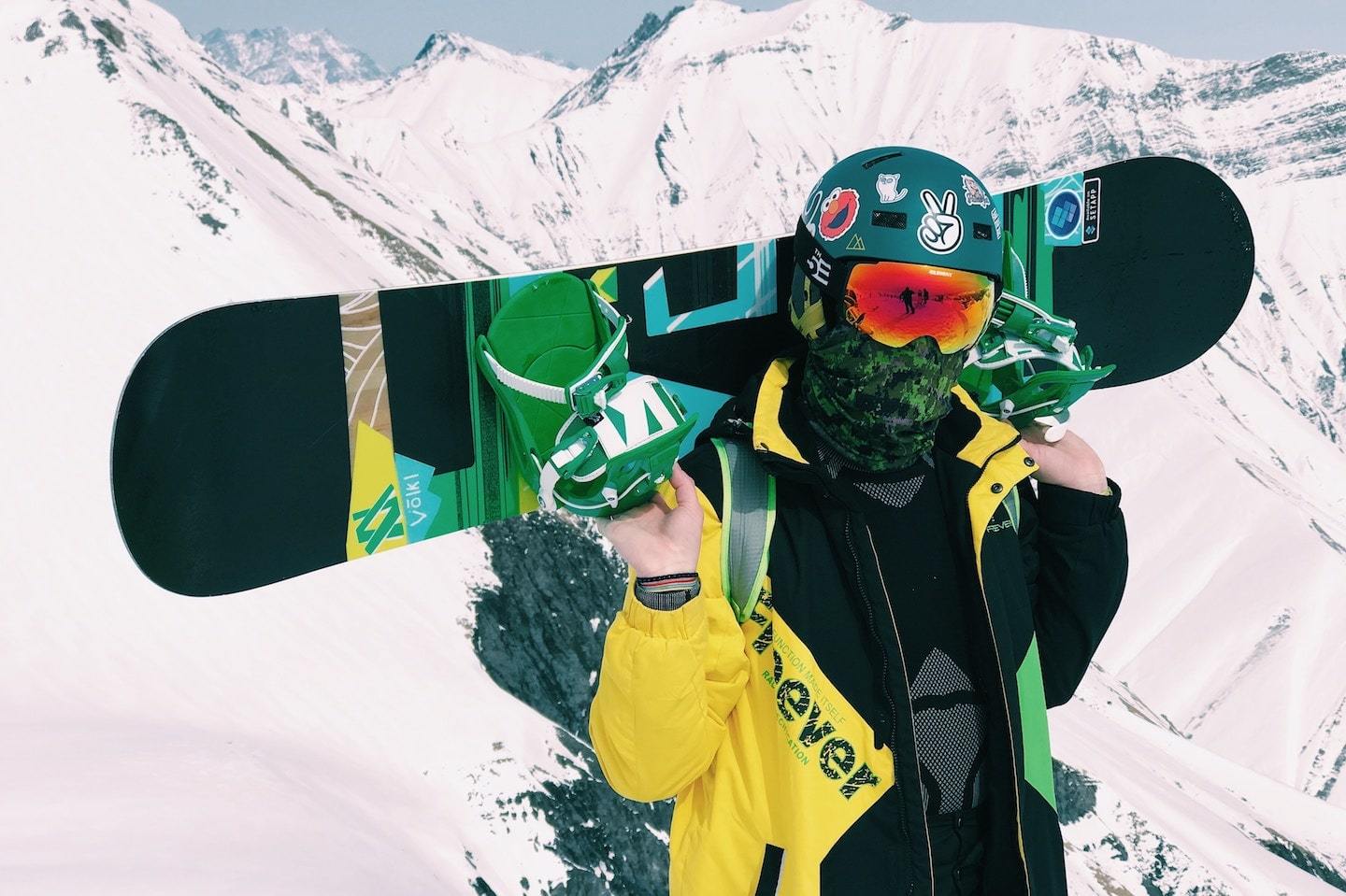 guy holding snowboard